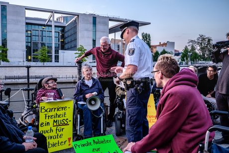 Demonstration in front of the German parliament building to protest against barriers in general and against a new law for the participation of people with disabilities in the parliamentary process.